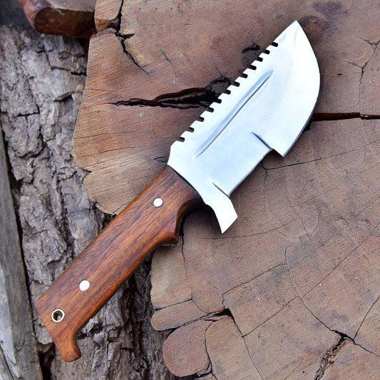 Close-up view of SXH1104 stainless steel tracker knife with polished rosewood handle showcasing fine craftsmanship.