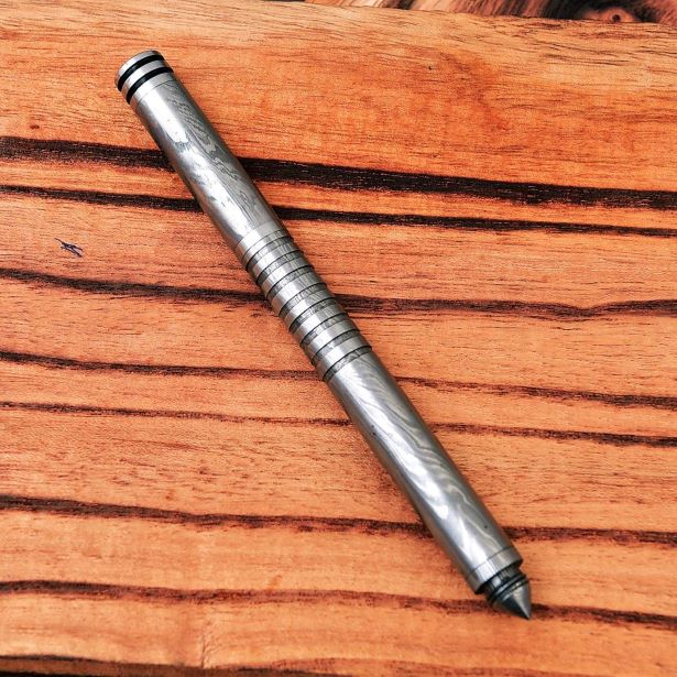 Functional and Collectible - Sharp Edge's Damascus Steel Pen with Meticulous Craftsmanship.