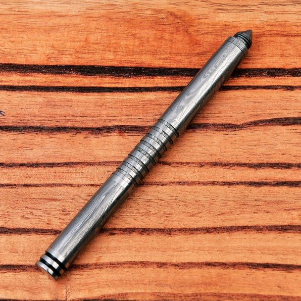 Unique Statement Piece - Sharp Edge’s Damascus Steel Ballpoint Pen for Refined Elegance.