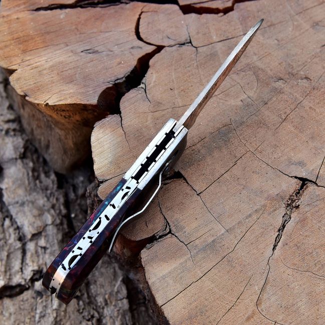 Close-up of liner lock mechanism on Damascus folding knife DLH 1106