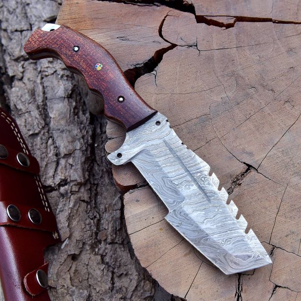 Close-up of Damascus tracker blade showing layered steel pattern – DXH-1101