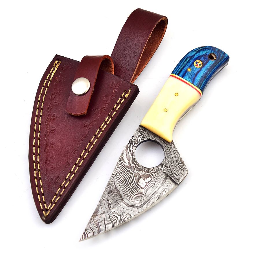 Knife and sheath displayed on white background showing Damascus pattern.