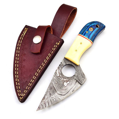 Knife and sheath displayed on white background showing Damascus pattern.