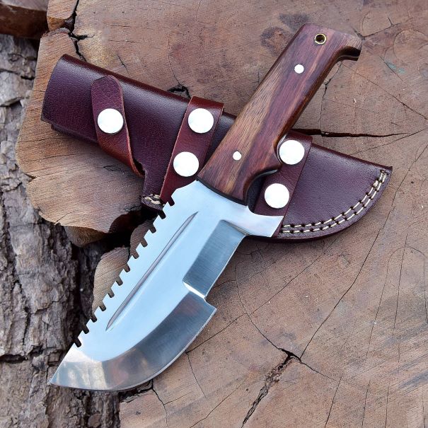 Rust-resistant stainless steel tracker knife SXH1104 presented diagonally to emphasize blade finish and durability.