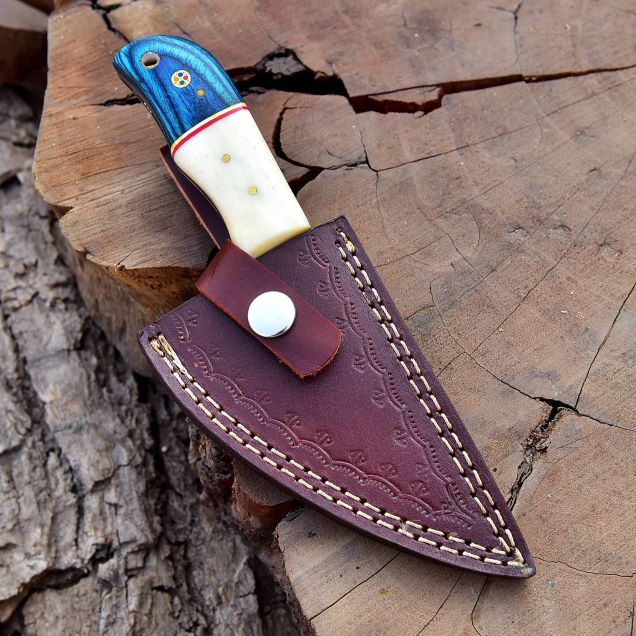 Premium hand-stitched leather sheath with knife partially inserted.